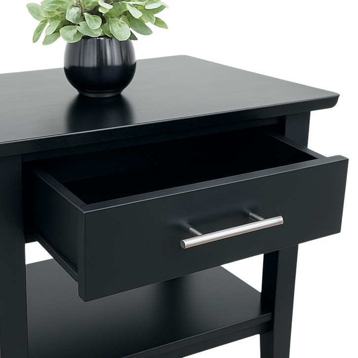 Sutton Black side table with drawer open, silver handle, lower shelf, and potted plant on top.