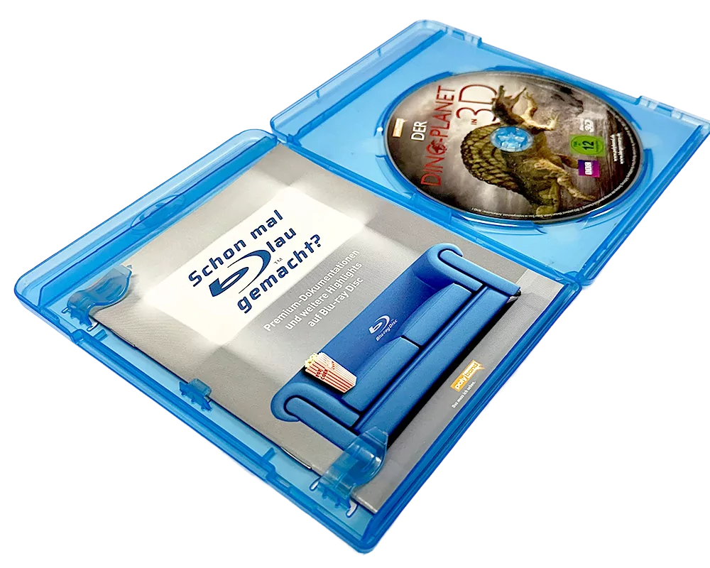 Open Blu-ray case showing a Dinosaur 3D Blu-ray disc and an insert, on a product page for Dinosaur Blu-ray.