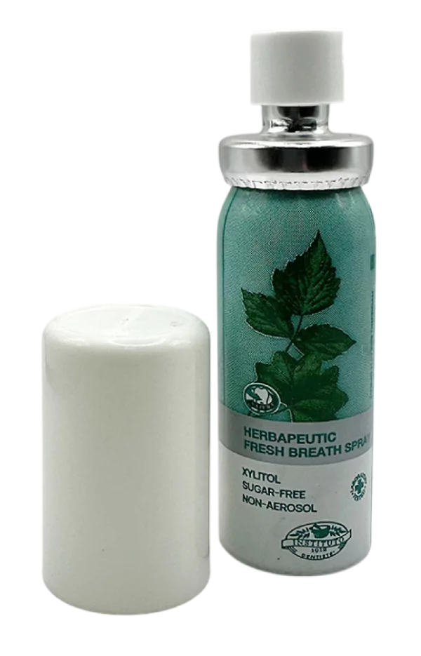 Travel pouch essential: compact herbal fresh breath spray with xylitol, ideal for on-the-go freshness.
