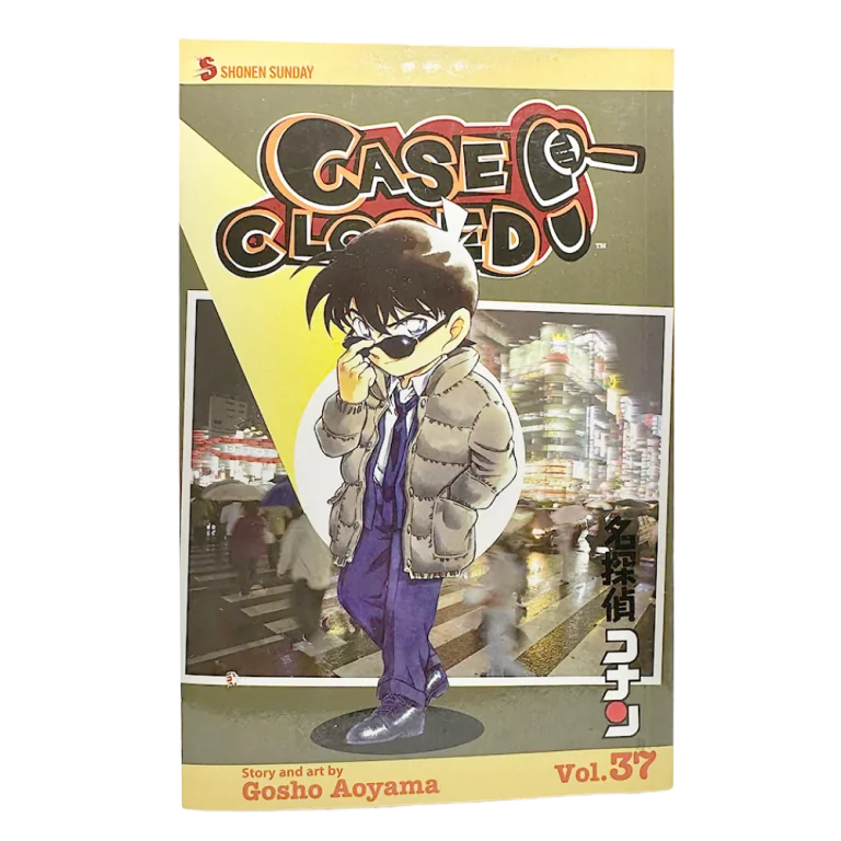 Forside af Detective Conan Bind 37 med Conan Edogawa foran en oplyst bybaggrund.