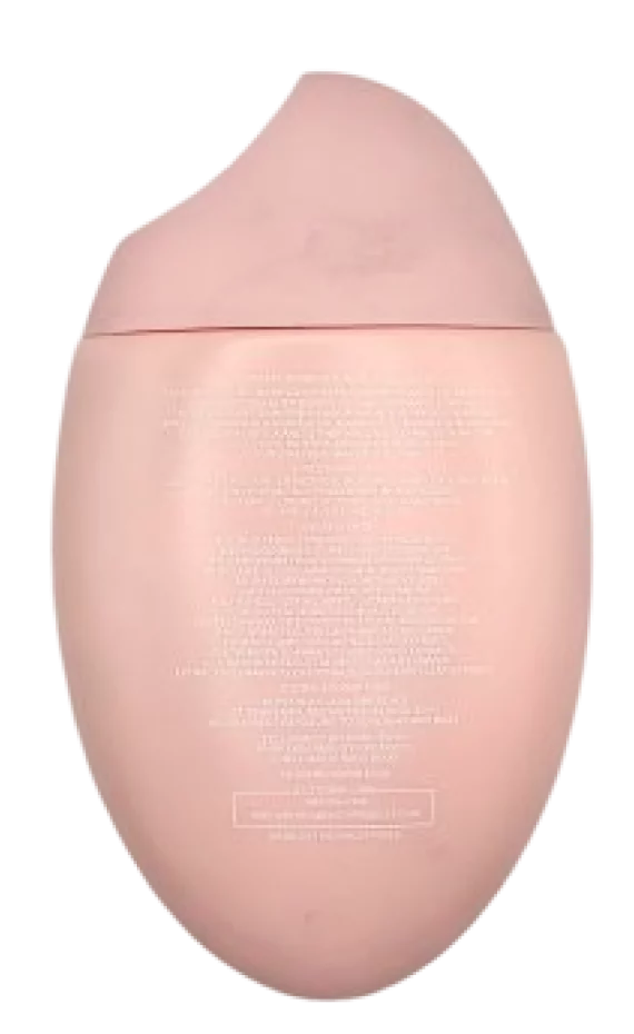 Baksidan av Fairy Skin Ljusgivande Solkräm i rosa förpackning med vit text.