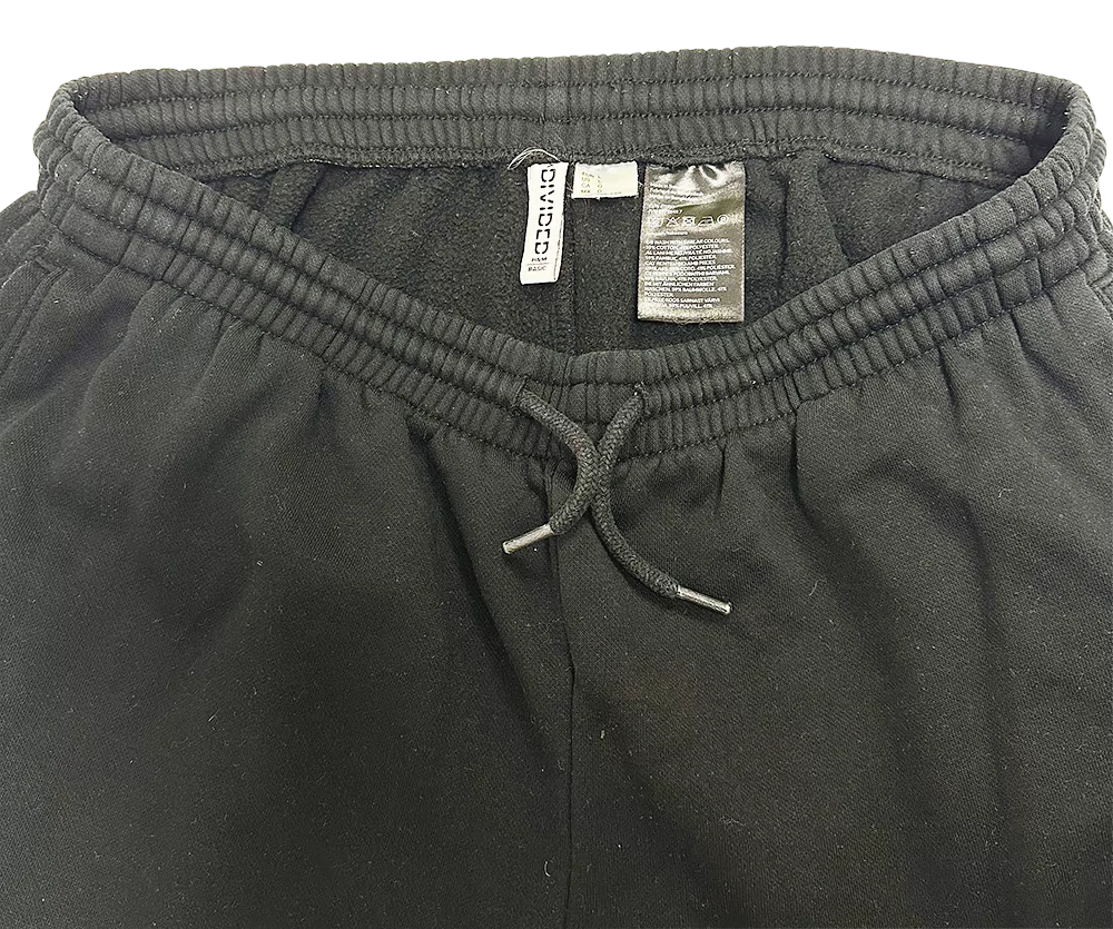 Fekete H&M női basic melegítőnadrág gumis derékrésszel és húzózsinórral.