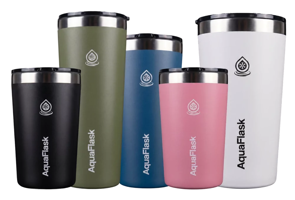 Assorted AquaFlask coffee travel mugs in black, green, blue, pink, and white with insulated design.
