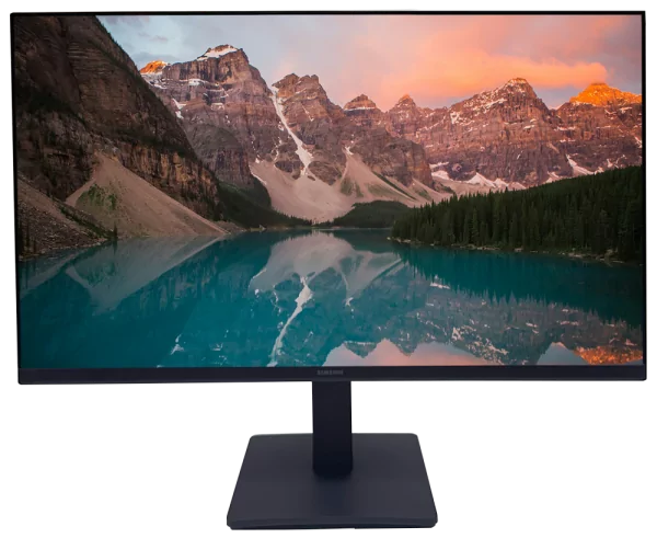 Modern desk with monitor stand, featuring a widescreen display showing a mountain lake landscape.