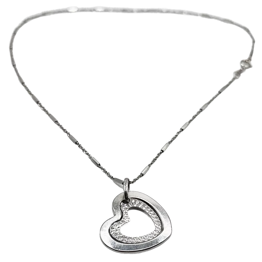 Silver heart pendant necklace with a delicate chain, displayed on a white background.