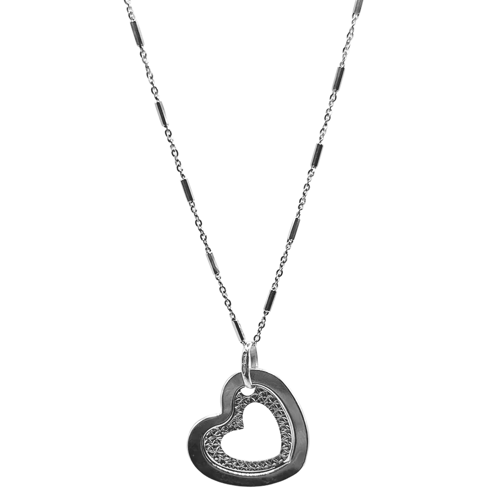Silver heart pendant necklace with textured open-heart charm on a delicate chain.