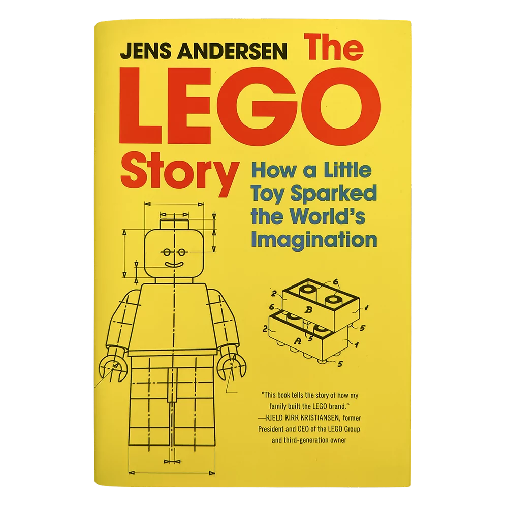 Bokomslag för "The LEGO Story" med en ritning av en LEGO-figur på gul bakgrund.