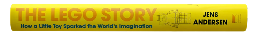 Bokomslag för "The LEGO Story" av Jens Andersen, visad på en produktsida.